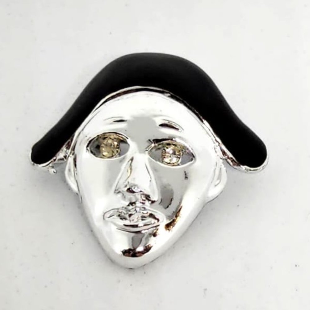 harlequin mask pin with zirconia eyes 1 inch